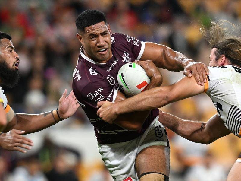 At 197cm and 120kg, powerhouse Taniela Paseka (c) is leading Manly's go-forward this season. (Darren England/AAP PHOTOS)