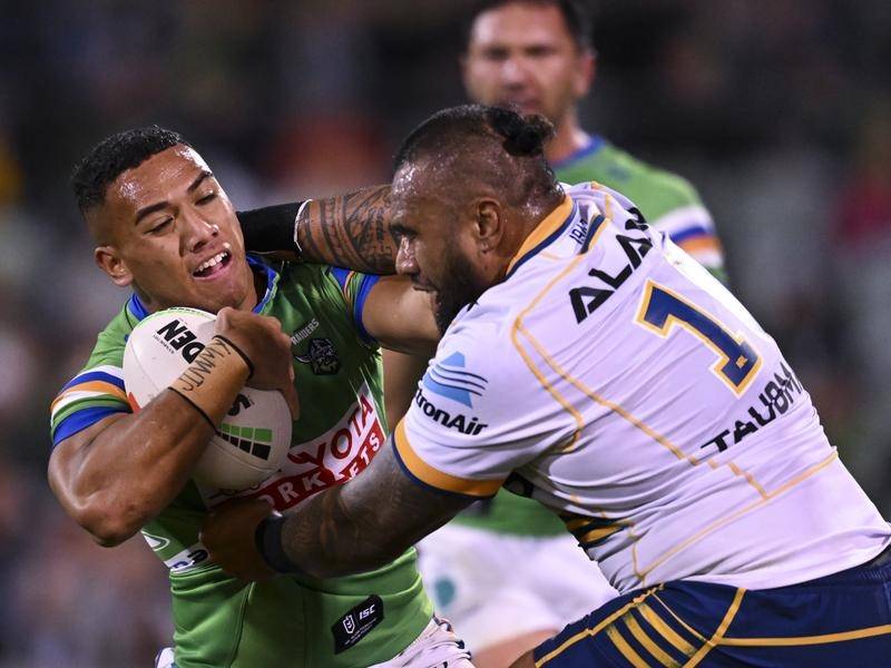Junior Paulo of the Eels (right) could be in trouble for a cannonball tackle. (Lukas Coch/AAP PHOTOS)