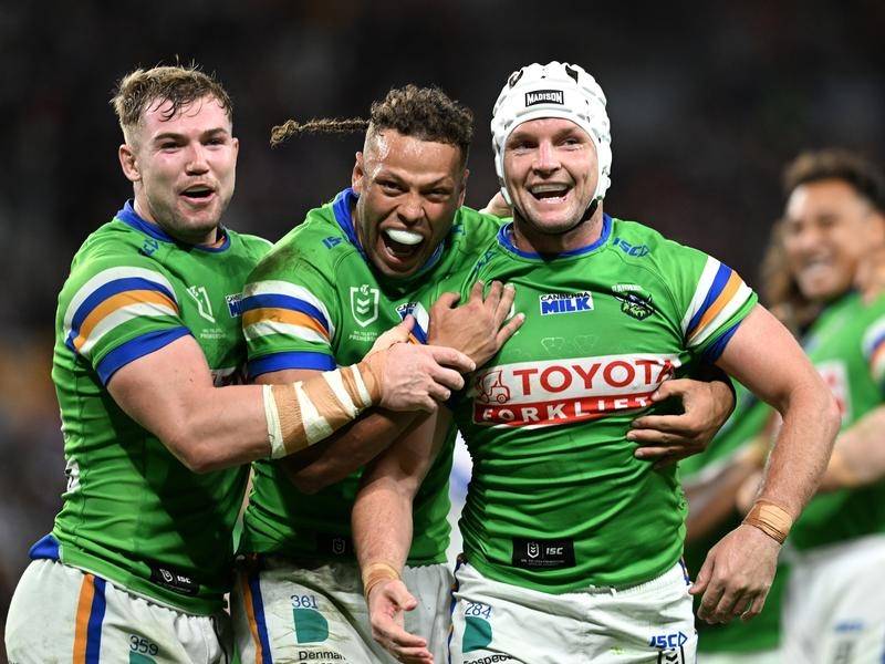 Jarrod Croker (right) celebrates scoring a try for the Raiders in Friday's win over Canterbury. (Darren England/AAP PHOTOS)