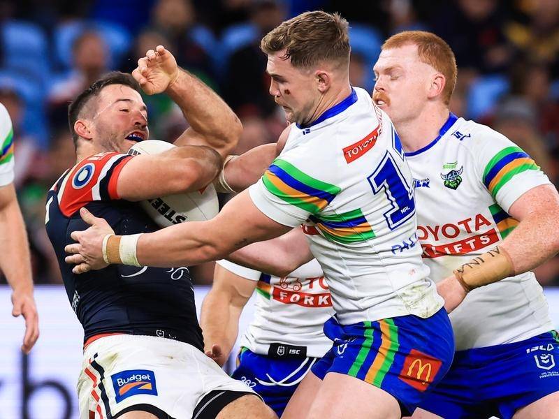 Canberra have survived a second-half fightback from the Sydney Roosters in a 20-18 NRL win. (Mark Evans/AAP PHOTOS)