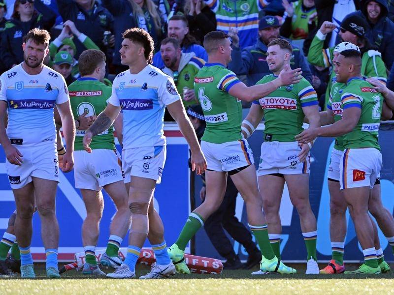 The Raiders celebrate Albert Hopoate's try in their 26-22 NRL win over Gold Coast in Canberra. (Mick Tsikas/AAP PHOTOS)