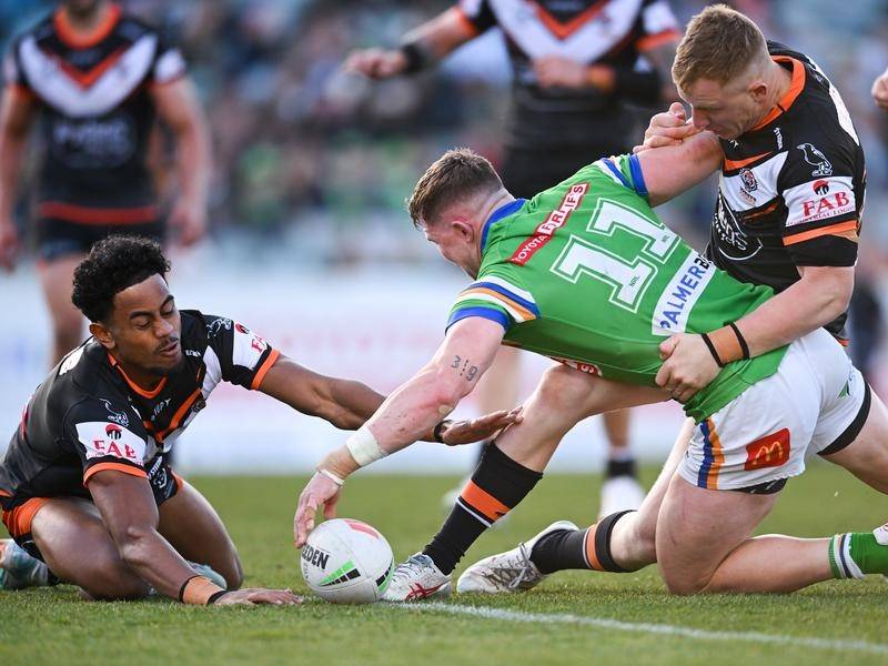 Canberra have fended off a late West Tigers fightback to secure an important 22-18 NRL victory. (Lukas Coch/AAP PHOTOS)