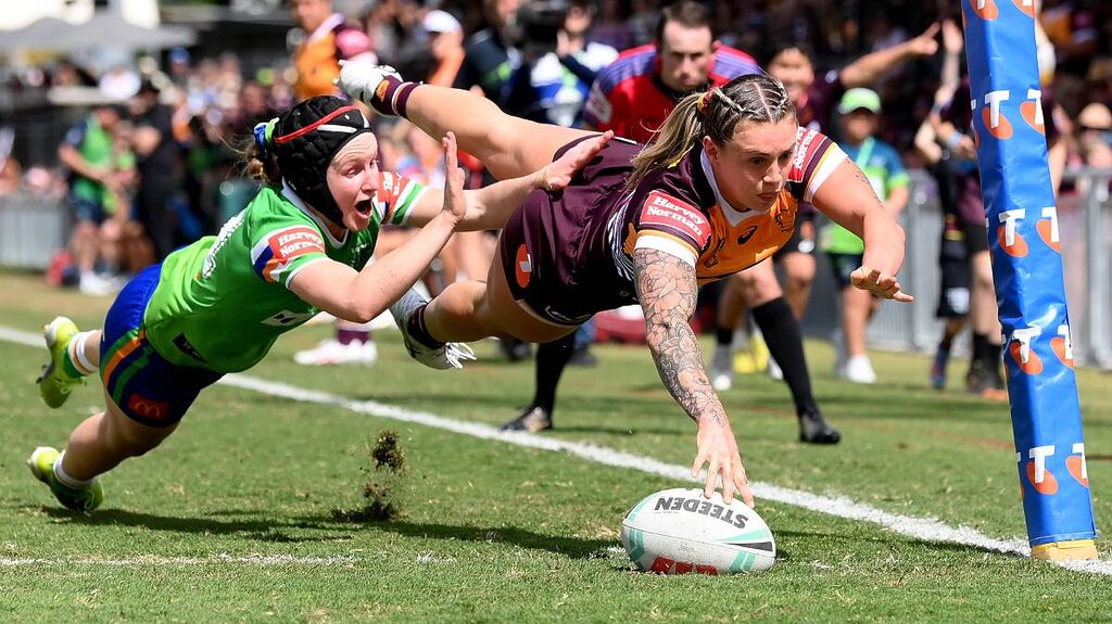 Brisbane winger Julia Robinson scores for the Broncos, who were far too strong for the Raiders. Picture Getty Images