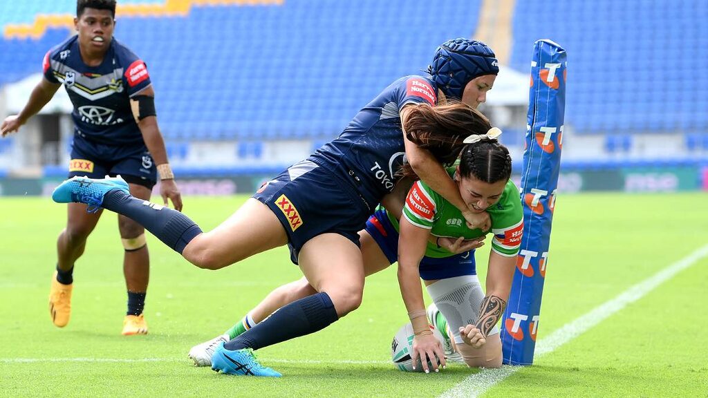 Canberra Raiders' Madison Bartlett crosses in the corner against North Queensland at Robina Stadium, Gold Coast, on Sunday. Picture Getty Images