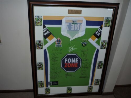 CANBERRA RAIDERS 2004 SIMON WOOLFORDS MATCH JERSEY SIGNED BY 19 PLAYERS  FRAMED