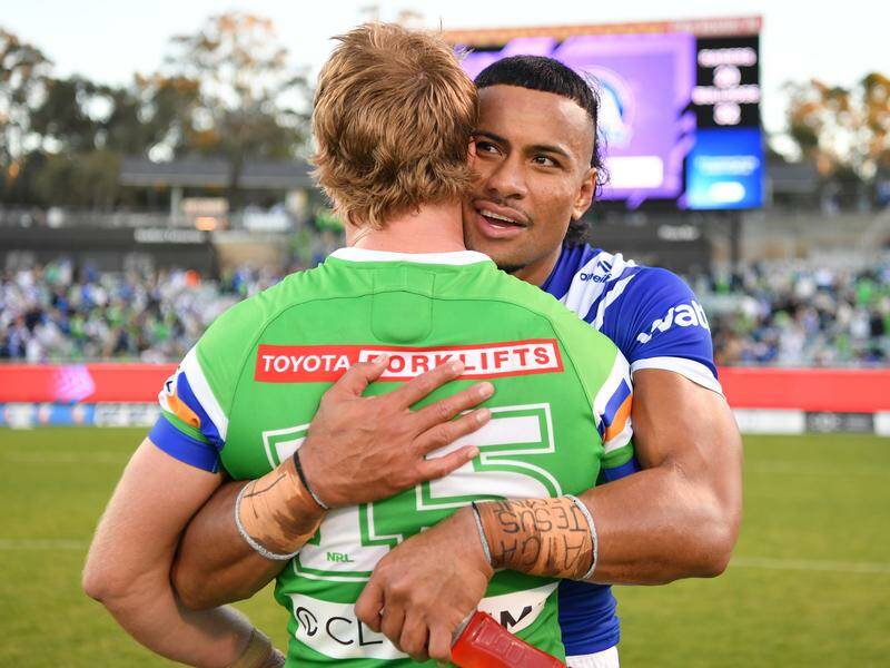 Canterbury's Stephen Crichton (right) hugs the Raiders' Zac Hosking after their clash in Canberra. Photo: HANDOUT/NRL PHOTOS