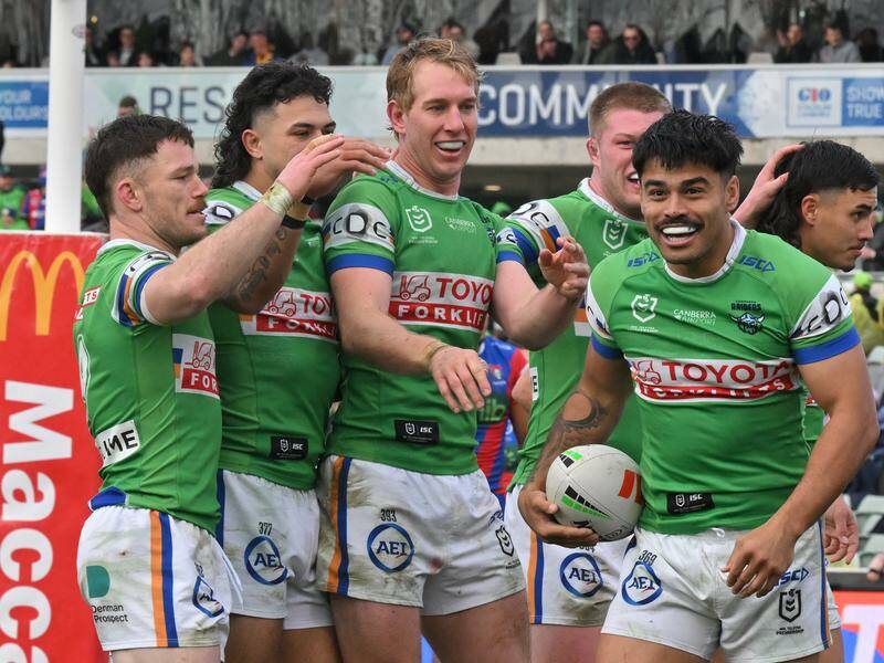 Matthew Timoko (second right) has led ladder leaders Canberra to an emphatic win over Newcastle. Photo: Mick Tsikas/AAP PHOTOS