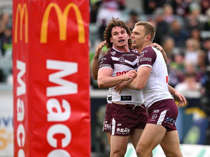 Ethan Bullemor (l) says it's need-to-win time for Manly as they prepare to face leaders Canberra. Photo: Lukas Coch/AAP PHOTOS