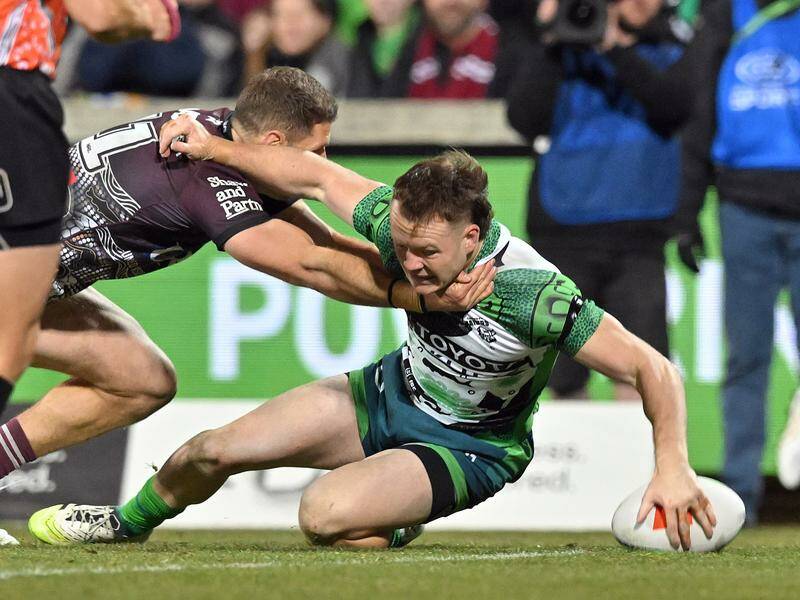 Canberra's Ethan Strange scored a hat-trick in the Raiders' win over the Sea Eagles.  Photo: Mick Tsikas/AAP PHOTOS