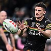 Nathan Cleary in a warm up,. with his arms stretched in front of him, preparing to catch a ball