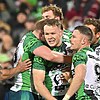Young Canberra star Ethan Strange (c) scored three tries as the Raiders defeated Manly. Photo: Mick Tsikas/AAP PHOTOS