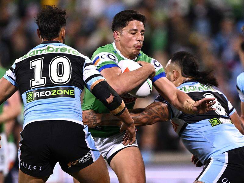 Raiders' Joe Tapine, on the ball in the loss to Cronulla, had his nose broken on a wretched night. Photo: Dan Himbrechts/AAP PHOTOS