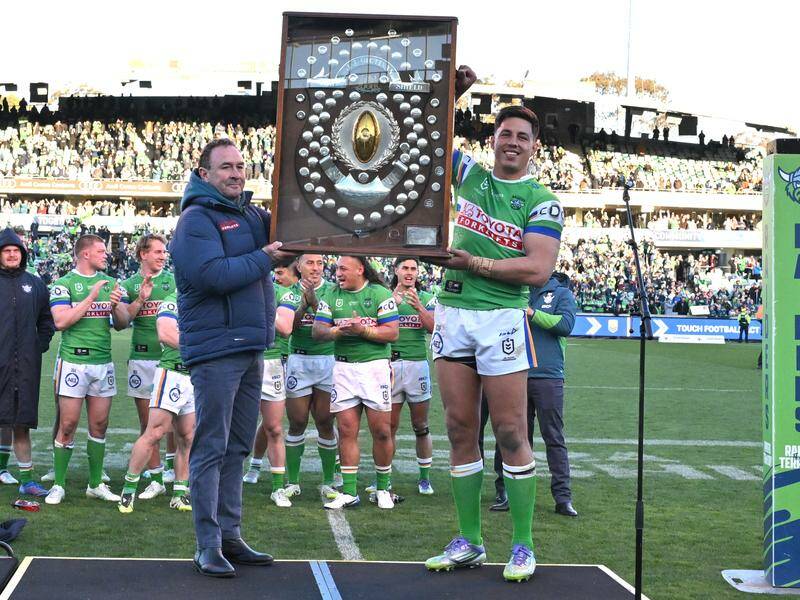 Raiders coach Ricky Stuart and captain Joseph Tapine with the JJ Giltinan Shield. Photo: Mick Tsikas/AAP PHOTOS