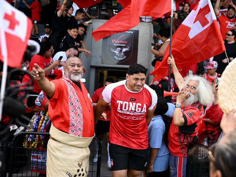 Jason Taumalolo (c) will be feted when the Tongan team returns to Tonga in October. Photo: Dan Himbrechts/AAP PHOTOS
