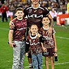 Reece Walsh with family, including daughter Leila.