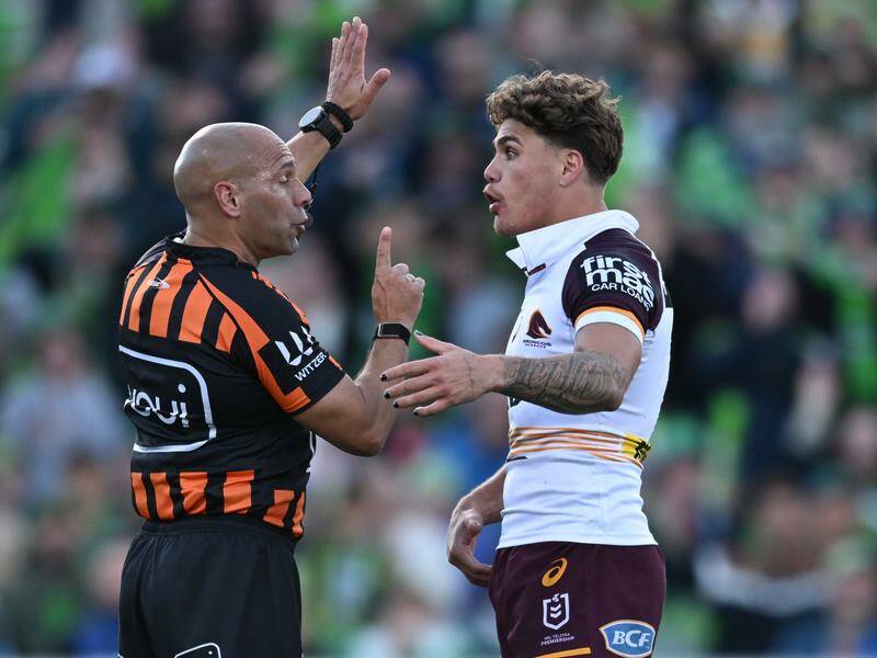 Brisbane's Reece Walsh pleads his case before being sent to the sin bin for a head-butt. Photo: Lukas Coch/AAP PHOTOS