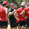 Tonga coach Kristian Woolf (centre) wants his players to be given more respect from the NRL. Photo: Darren England/AAP PHOTOS