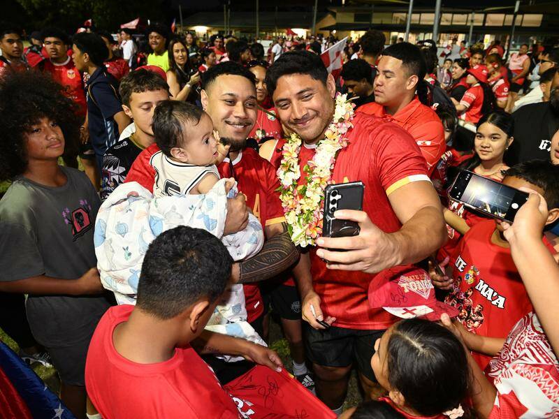 Jason Taumalolo (c) is revered by fellow Tongans and his career would be complete with a home Test. Photo: Darren England/AAP PHOTOS
