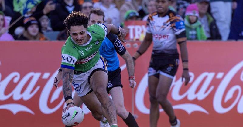 Flyer Xavier Savage scored one of 10 Canberra tries in a thumping win over the toothless Tigers. Photo: PR IMAGE PHOTO